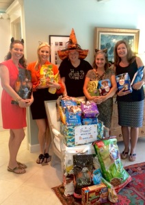 Our staff and agents excited to deliver the pounds of pet food to deserving companions! 